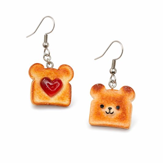 Aretes pan tostado con mermelada y osito